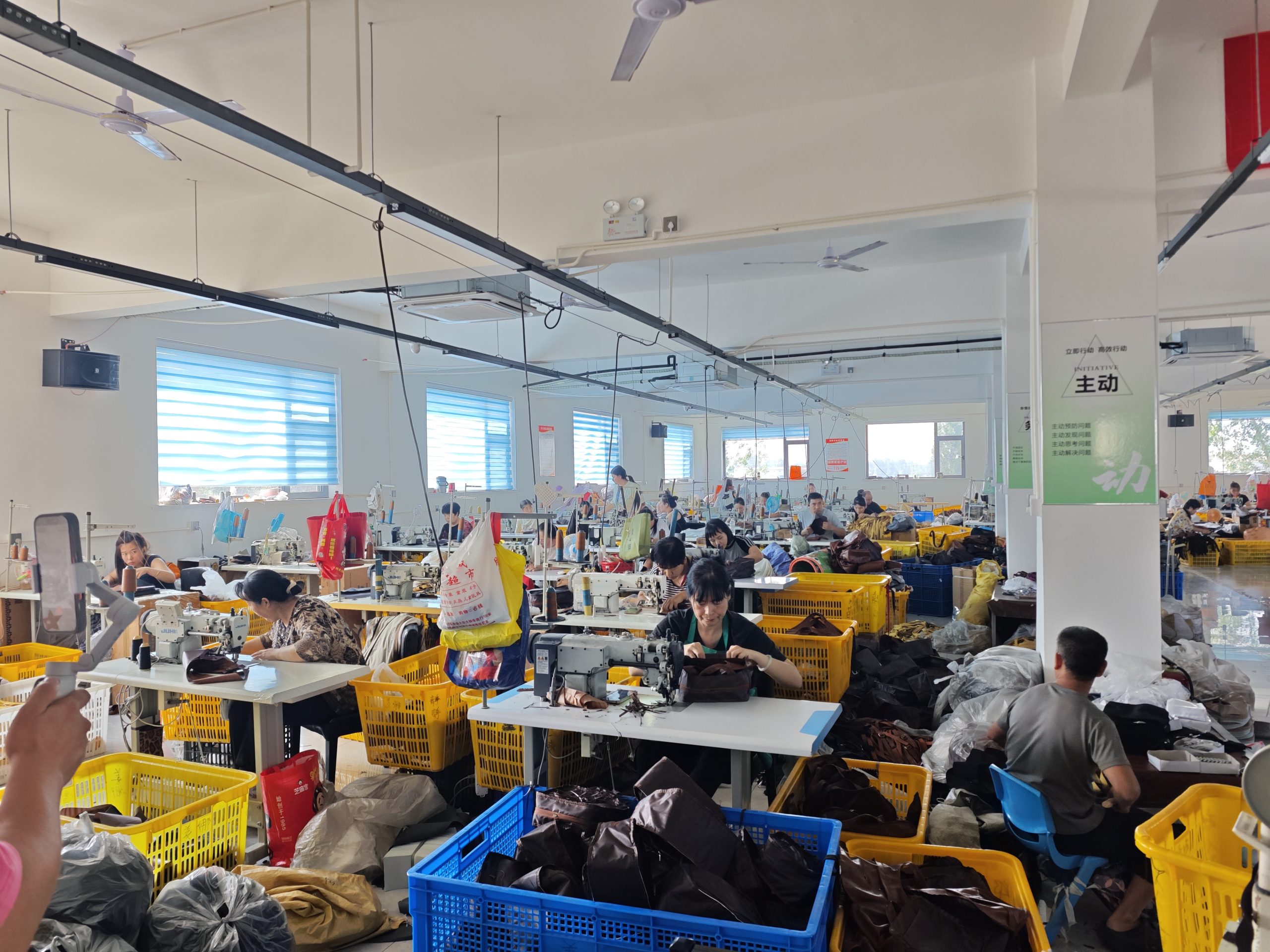 Workers producing bags in the Shangbaige workshop